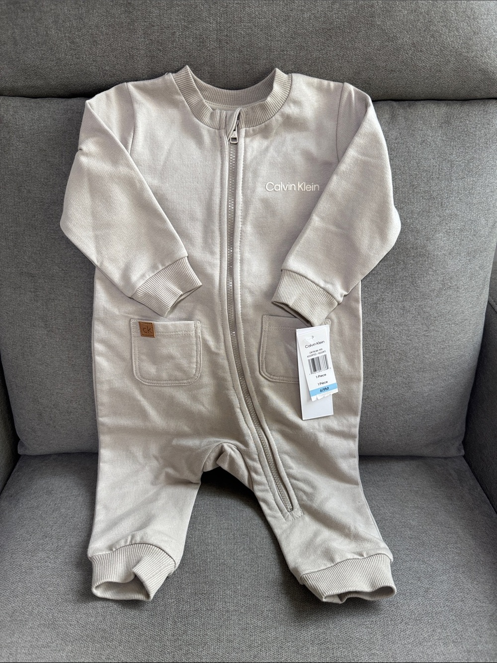 Brand New with tags Calvin Klein Light Beige Baby Zip One-Piece Footie